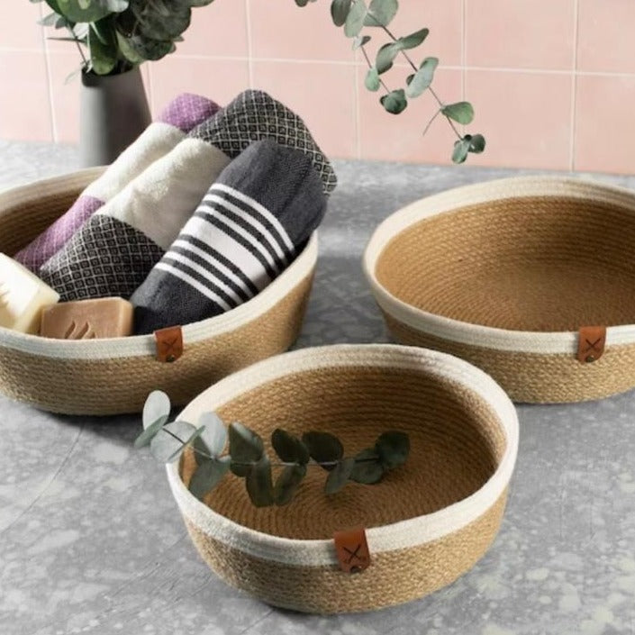 Set of three woven jute bowls